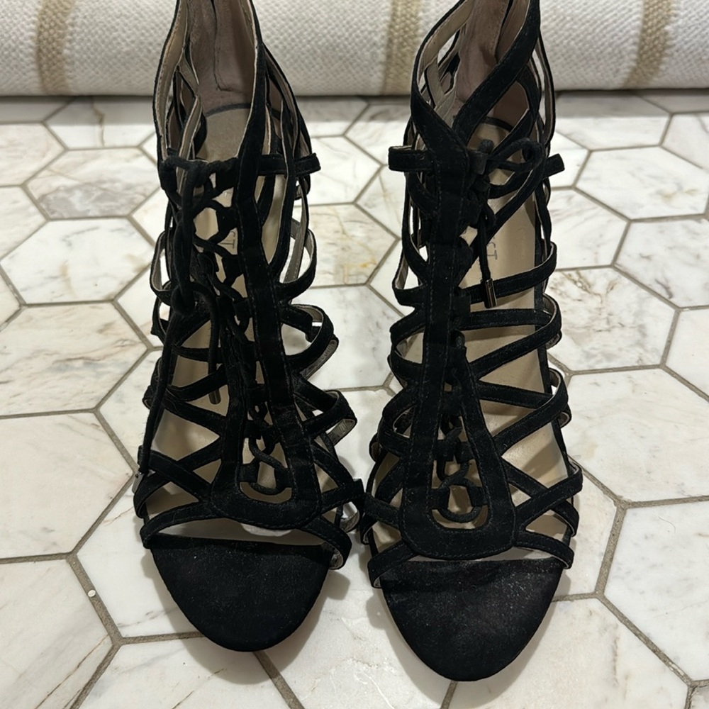 Sexy strappy stiletto black Nine West shoes with lace up detail. 3.5 in heel 8.5